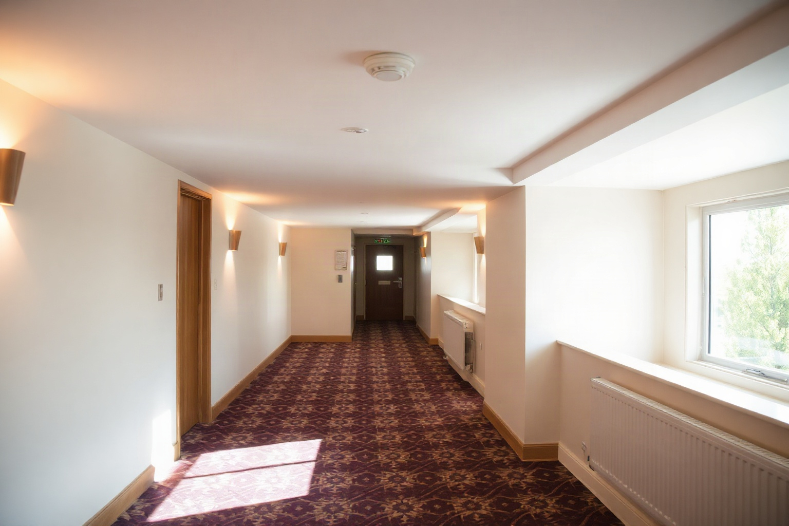 Hotel corridor with a ceiling access point